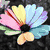A four- of pixelated floral and abstract designs with no visible motion