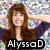 A pixelated image shows a woman with long brown hair in a purple top, with text reading 'Alyssa D' below her, and a group of people with text 'Loves' below them.