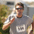 Pixelated image of a person in a gray shirt with a white rectangle on chest, holding a phone to ear, surrounded by purple text reading "theres my DADDY!!!".