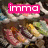 Pixelated image of a DNA double helix with overlaid text banners in pink, black, and purple.