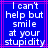 Blue background with white pixelated text reading "I can't help but smile at your stupidity" framed by pink lines