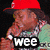 Two figures in a pixelated image: one wearing a red cap and patterned shirt, the other in a blue shirt holding a microphone, with text overlays reading 'wee' and 'ooh'.