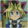 Animated character with spiky blonde hair and purple eyes, wearing a blue jacket over white shirt, standing before pink star-shaped background.