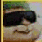 A four- shows a pixelated character with dark sunglasses and green hair, displaying text changes