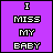 Purple background with white text "I MISS MY BABY" in pixelated font, animated color changes on letters and small blue dots appear.