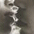 A 2x2 contact sheet of a four-frame animation showing a grayscale kiss scene, red Nike logo, and "Just Do It" text on black backgrounds with gray transparency.