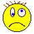 Pixelated yellow circular emoji with asymmetrical eyes, downturned mouth, and spiky brown hair against a white background.