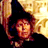 Pixelated static icon showing a stylized character with dark hair and warm-toned skin against a bright background, featuring visible dithering and color blending effects.