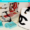 A static image shows a white jewelry box with open drawers revealing red beaded necklaces and a blue plastic tray holding small items.