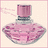 A pixelated pink perfume bottle with a rounded body and cap, set against a light background on the left side of an image.