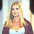 A 50x50 pixel animated buddy icon featuring a woman with long blonde hair in two frames, alongside green text reading "Original Icons .com" on a dark background.