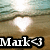 A pixelated beach scene with a heart-shaped light reflection on water, overlaid by bold text reading 'Mark<3' in white letters against black background.