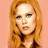Static 48x48 pixel icon of a person with long red hair against a peach background, rendered in low-resolution pixel art style.
