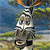 A pixelated static image shows a stylized animal figure with striped patterns against a blurred background of blue sky and green terrain.