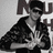 Black-and-white animated icon shows a person in a patterned jacket making a hand gesture with both hands, background features repeated 'MU' text.