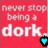 Red background with white text reading "never stop being a dork." and two cyan heart icons.