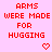 Red pixelated text 'ARMS WERE MADE FOR HUGGING' repeated across a pink background with small red heart symbols below each phrase.
