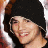 A 48x48 pixel buddy icon split into two sections: a person wearing a black beanie on the left and green text "OriginalIcons.com" on a dark green background on the right.