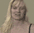 Animated contact sheet of a woman with long blonde hair in various poses and expressions across seven frames, displayed on a gray background.