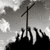 Black-and-white pixelated image of a wind turbine on a hill under a cloudy sky with visible cloud patterns.