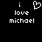 Pixelated text 'i love michael' with a heart symbol replacing the 'o' in 'love' on a black background.
