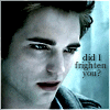 identical static images showing a person with dark hair and a dark jacket against a light blue background, with text below reading "did I frighten you?"