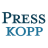 Pixelated text displays 'PRESS KOPP' in two lines on a light gray background with blue and dark blue lettering.