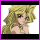 Pixelated anime-style character with long blonde hair, purple eyes, and a light skin tone in two side-by-side frames showing slight head movement.