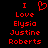 Red pixelated text on black background reads 'I Love Elysia Justine Roberts' with a heart symbol replacing the word 'Love'.