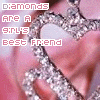 A hand holds a large, heart-shaped diamond necklace with text reading 'DIAMONDS ARE A GIRL'S BEST FRIEND' in pink pixelated letters.