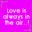 A static image with a bright purple background displaying repeated text "Love is always in the air..!" in white pixelated font, surrounded by green and purple star-shaped decorations.