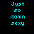 A static digital image displays repeated cyan text "Just so damn sexy" on a black background with scattered blue dots, arranged in four and three
