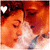 Two people in close proximity with eyes closed, wearing light-colored clothing and dark hair; a small white heart icon appears in the top-left corner of each frame.