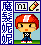 Pixel art character with red hair and white stripe, black checkered shirt, blue pants, red-and-white shoes, standing on green grass against light blue background.