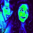 Two pixelated faces with green and blue coloration against a dark background, one face turned left, the other facing forward.