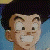 Pixelated cartoon character with dark hair, light skin, and a wide open mouth showing teeth against a blue background.