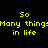 Yellow pixelated text "So Many things in life" on black background with white rectangular overlays shifting across the image.