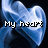 Blue heart-shaped icon with pixelated text reading 'My heart turns blue at the thought of you' over a dark background.