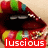 A pair of stylized lips with colorful candy-like shapes above and below, featuring a red banner with white text at the bottom.