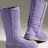A static image showing a pair of light purple boots with pixelated text reading "I Love My Shoes!" on a black background.