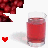 A pixelated red drink in a glass with white foam, accompanied by a small red heart icon and dark red floral shapes above.