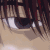 Anime-style close-up of a character's eyes with dark hair strands, showing sequential animation frames of eye movement and light reflection changes.
