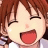 A pixelated anime-style character with brown hair and a winking expression on the left, next to black background text reading "Anime IM" and "COM" on the right.