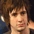 A four- shows a person with brown hair in two different poses, an explosion graphic, and empty space