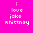 A bright pink background displays two identical pixelated text blocks with a purple heart symbol above the left block.