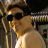 A 48x48 pixel buddy icon featuring a split composition with a person on the left and green text on the right, displayed as part of an animated contact sheet.