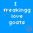 Blue background with repeated white text "I freaking love goats" and red heart symbols in a