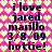 Pixelated text on a pink and yellow heart-patterned background with no visible animation changes.