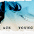 Pixelated blue and black character face with large eyes, light-colored lower half, and text reading "ACE" and "TOMO" at bottom.