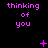Purple text reading 'thinking of you' on black background with animated symbols appearing and changing across frames.